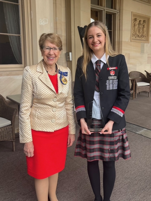 Ella Johnson with Governor of New South Wales Margaret Beazley after receiving a Youth Community Service Award at Government House.